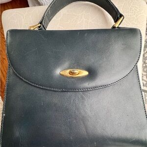 Vintage adorable and timeless little purse!